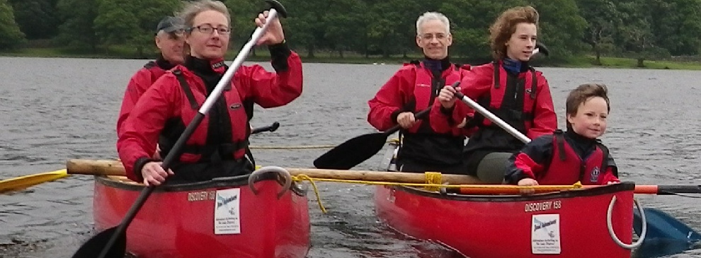 Famiily adventure canoeing on Consiton Water